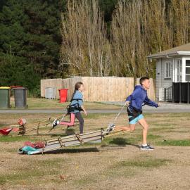 Young Inspiring Explorers race their sleds (007)