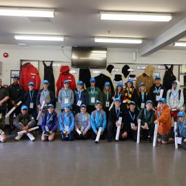 Group photo at the USAP warehouse at the Young Inspiring Explorers Summit