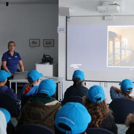 Young Inspiring Explorers attend a presentation at the International Antarctic Centre