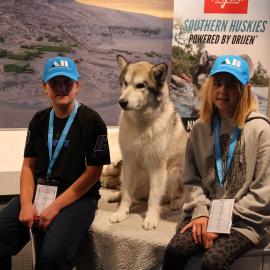 Young Inspiring Explorers Nat and CJ meet a husky