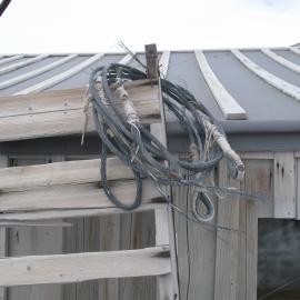 Sled and steel wire, west wall of Scott's 'Terra Nova' hut
