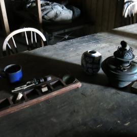 2014-15 Scott's 'Terra Nova' hut, interior, Wardroom table artefacts