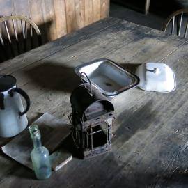 2014-15 Scott's 'Terra Nova' hut, interior, Wardroom table artefacts