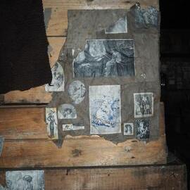 Pictures decorating bunk, Scott's 'Terra Nova' hut