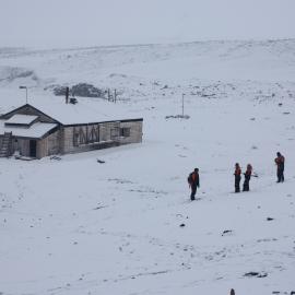 2022 Scott's 'Terra Nova' hut, environs, and AHT staff during snowfall (001)