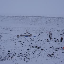 2022 Scott's 'Terra Nova' hut, environs, and AHT staff during snowfall (002)
