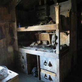 2022 Scott's 'Terra Nova' hut, interior, bunks of Nelson and Day, Biology area